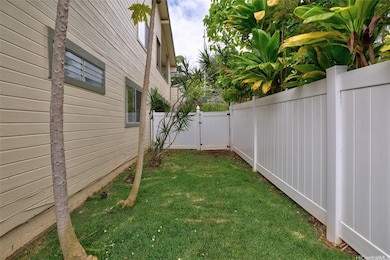 SIDE YARD - Enjoy home grown papaya! Convenient ga