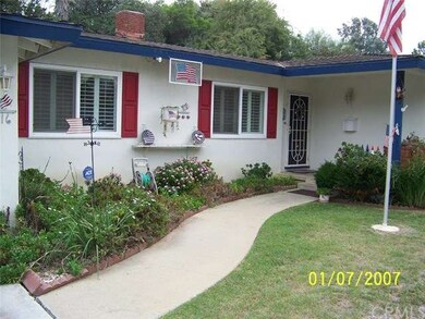closer look at front of home and front porch.