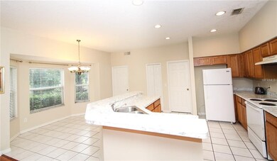 Kitchen with new countertops and pantry flows into