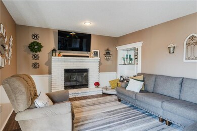 Great Room features wood burning fireplace and bui