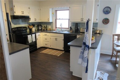 Plenty of cabinets and new flooring.