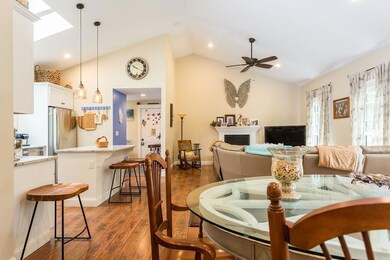 The vaulted ceiling makes the space...