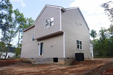 View of property exterior featuring central AC