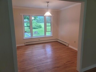 Dining room with pocket door to kitchen, overlooki