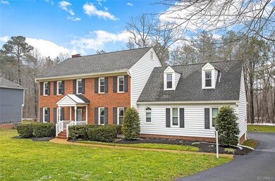 Professionally landscaped/maintained lawn with spr