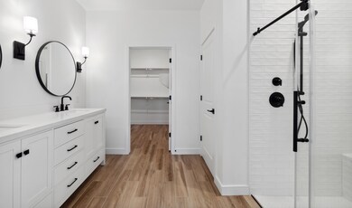 Primary bath with matte black accents