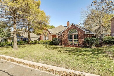This one story brick home is close to the Chisholm