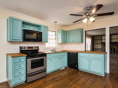 The kitchen comes with great wood counter tops and overlooks the backyard!