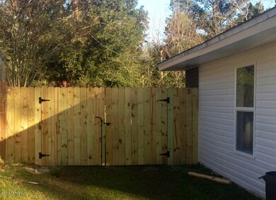 azalea fenced back yard