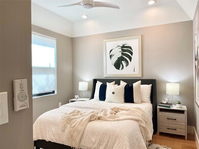 Bedroom with a ceiling fan, recessed lighting, an