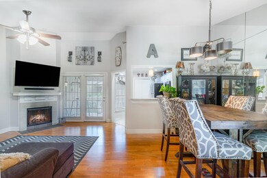Dining area featuring ceiling fan, light hardwood 