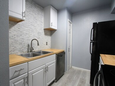 Dual sink with a gorgeous backsplash for everyday functionality.