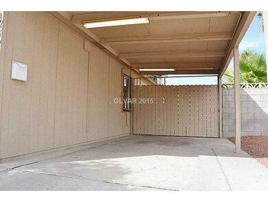 Property Photo. Carport with overhead lighting