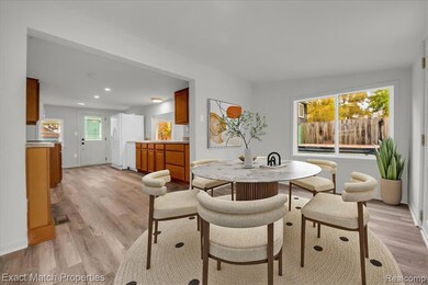 Dining space featuring light wood finished floors