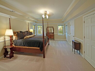 Large master bedroom has new carpet, walk in close