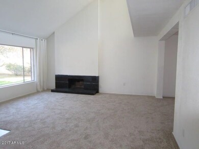 VAULTED LIVINGROOM W/FIREPLACE