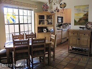 Bright Dining Room w/ 3-sided fireplace