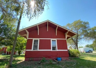 View of home's exterior with a yard
