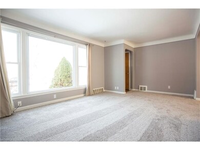 Clean, bright, and welcoming family/living room.
