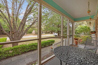 Enjoy views of the giant Magnolia out front from y