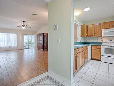 TO THE RIGHT OF THE FOYER IS YOUR KITCHEN.