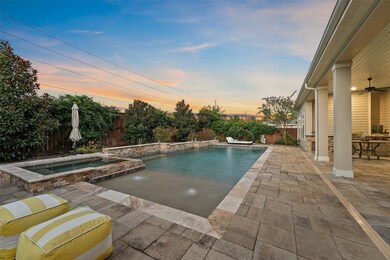Step outside to enjoy this beautiful heated pool and spa - and no back neighbors for added privacy.