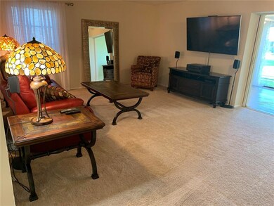 Family room from end of entry hall, large screen T