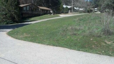 Corner Lot in Bass Lake Annex 3 has water to lot, 