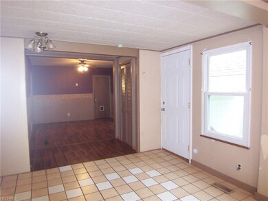 Dining room viewed from the kitchen.