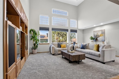 Built in entertainment center and vaulted ceiling