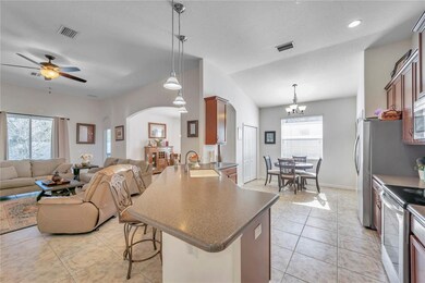 The spacious living room-kitchen combo featuring a