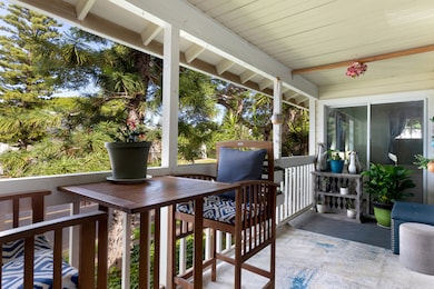 Enjoy morning coffee or evening cocktails on this lovely lanai