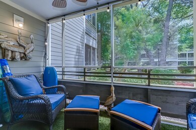 Sunroom / solarium with ceiling fan and a healthy 