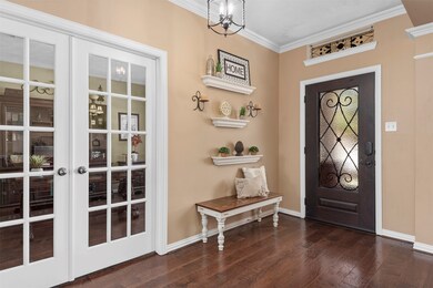 Updated Hand scraped wood flooring, neutral paint, and updated light fixtures are just the beginning of the updates you will wind in this home.  The wood floor runs throughout the entire first floor.