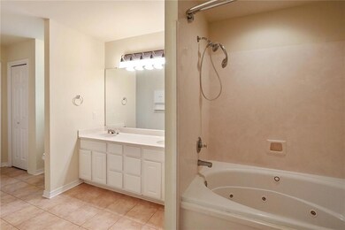 Master Bathroom has jetted garden tub, double vani