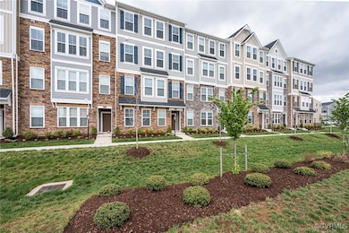 View of front of property with a front lawn and a