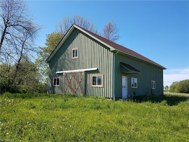 Lovely newer barn has concrete floor and loft.