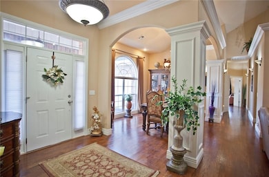 Entrance to formal dining with brilliant wood floors