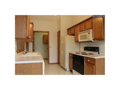 Kitchen view with Laundry Room and Pantry Access