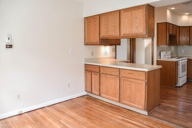 Dinette with hardwood flooring.