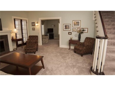 Living Room view to the den/library. Newer carpet.