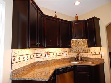 AMAZING KITCHEN WITH GRANITE, BACK SPLASH, AND UND