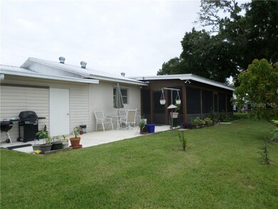 OPEN PATIO, WORKSHOP AND BACK OF FLORIDA ROOM