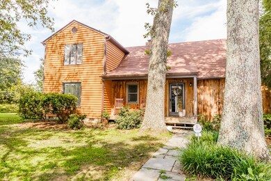 CEDAR SIDING ON A 2 STORY HOUSE THAT SITS ON 2 ACRES. WOODED LOT ALLOWS PRIVACY. DETACHED GARAGE WITH ATTACHED WORKSHOP, DETACHED SHED, LANDSCAPED