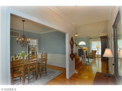 Foyer - Front Foyer with Hardwood Floors, Crown Mo