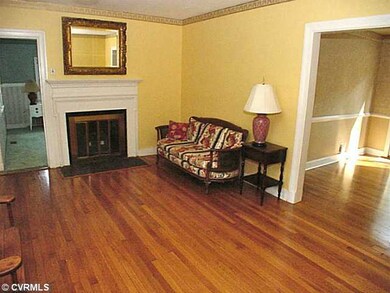 Living Room - Refinished oak floors & cased openin