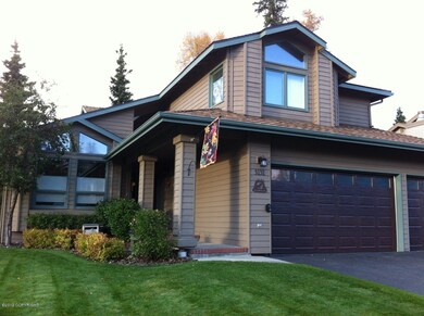 Front porch, 3 car garage