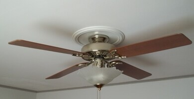 Ceiling fan in Living Room, there is also a fan in