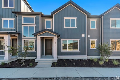 View of front facade with board and batten siding