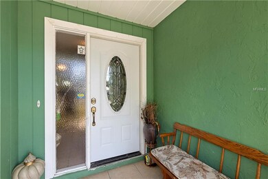 View of Front Door in the Screened in Porch